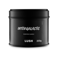 Intergalactic. A round, black, candle tin with a removable lid. The black label on the front reads "Intergalactic" in white text.